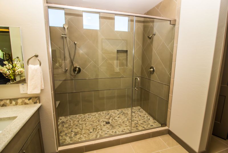 Shower Featuring Natural Stone Accents